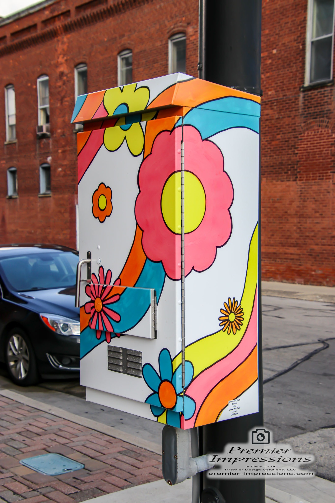 An Art is Power utility-box mural downtown